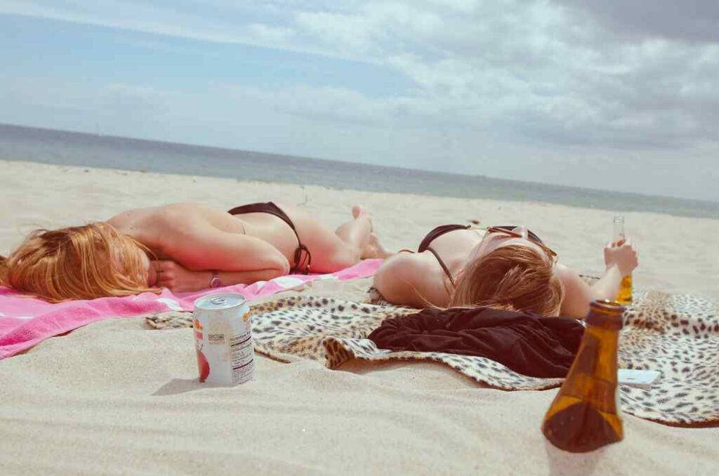 Two girls taking sunbath